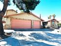 A home featuring a spacious driveway and a two-car garage at 3155 Mountain Spring Rd, Las Vegas, NV 89146