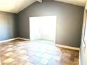 This living room has tile flooring and neutral paint at 3155 Mountain Spring Rd, Las Vegas, NV 89146