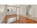 Bright living room with hardwood and tile floors at 33 Gentilly Lace Ave, Henderson, NV 89002