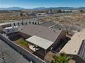 Home with covered patio, large backyard, and mountain views at 5001 Ray Frank Blvd, Pahrump, NV 89060