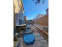 Small backyard with patio and some furniture at 5345 Tustin Hills St, North Las Vegas, NV 89081