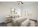 Spacious main bedroom with plush bedding and elegant nightstands at 6304 Tanzanite Ave, Las Vegas, NV 89130