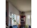 Bright living room with large windows and built-in shelving at 637 Bay Bridge Dr, North Las Vegas, NV 89032