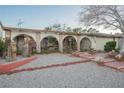 Front view of the house with decorative landscaping and a walkway at 6513 Hyde Ave, Las Vegas, NV 89107