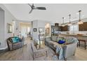 Spacious living room featuring hardwood floors and comfortable seating at 900 Mckinley View Ave, Henderson, NV 89012