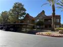 Exterior view of a two-story building with Spanish-style architecture at 2200 S Fort Apache Rd # 1207, Las Vegas, NV 89117