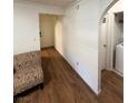 Light and bright entryway with wood-look flooring and access to laundry area at 2200 S Fort Apache Rd # 1207, Las Vegas, NV 89117