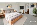 Virtually staged main bedroom with wood-like floors and ample light at 3615 American Pie Ct, Las Vegas, NV 89129