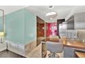 Open concept kitchen with breakfast bar and modern finishes at 4381 W Flamingo Rd # 3519, Las Vegas, NV 89103