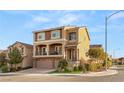 Two-story house with a two-car garage and balcony at 6595 Creekside Cellars Ct, Las Vegas, NV 89139