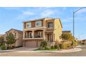 Attractive two-story home featuring stone accents, a covered balcony, and well-maintained landscaping at 6595 Creekside Cellars Ct, Las Vegas, NV 89139