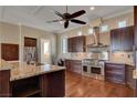 Gourmet kitchen with granite counters and stainless steel appliances at 1323 Red Baron Ln, Boulder City, NV 89005