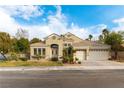 Beautiful two-story home with a large front yard and attached garage at 1350 Rossini St, Henderson, NV 89052