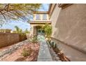 Landscaped walkway leading to the front entrance of the house at 3402 Arcata Point Ave, Las Vegas, NV 89141