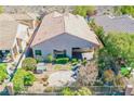 Single-story home with a spacious backyard and patio at 36 Hunt Valley Trl, Henderson, NV 89052