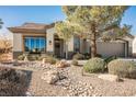 One-story house with rock landscaping and a spacious front yard at 493 Lace Haven Ct, Henderson, NV 89012