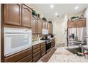 Modern kitchen featuring stainless steel appliances and granite countertops at 493 Lace Haven Ct, Henderson, NV 89012