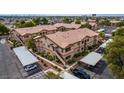 Aerial view of a condo complex with ample parking at 5751 E Hacienda Ave # 244, Las Vegas, NV 89122