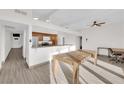 Kitchen with island, stainless steel appliances, and dining area at 6205 Hargrove Ave, Las Vegas, NV 89107