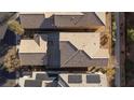 Aerial view of houses showing backyard patios and roofs at 8789 Ashley Park Ave, Las Vegas, NV 89148