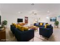 Bright and airy living room with navy and yellow furniture at 1303 S 8Th St, Las Vegas, NV 89104