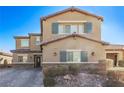 Two-story house with gray shutters and a landscaped front yard at 1413 Fantastic Ct, North Las Vegas, NV 89081