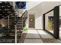 Modern staircase with a metal railing and stone flooring at 168 Still Shores St, Henderson, NV 89011