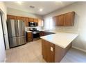 Modern kitchen with stainless steel appliances at 1880 Hollywell St, Las Vegas, NV 89135