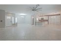 Open floor plan combining living room and kitchen areas at 2951 Maffie St, Henderson, NV 89052