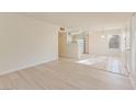 Open living space with a view into the kitchen area with tile floors at 3425 E Russell Rd # 227, Las Vegas, NV 89120
