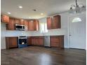 Renovated kitchen, featuring new cabinets and flooring at 929 Center St, Henderson, NV 89015