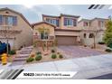 Two story house with attached garage and landscaped front yard at 10823 Crestview Pointe Ave, Las Vegas, NV 89166