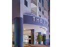 Hotel entrance, modern design with signage and landscaping at 211 E Flamingo Rd # 1114, Las Vegas, NV 89121