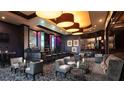 Upscale hotel lounge with comfortable seating and a bar at 211 E Flamingo Rd # 1114, Las Vegas, NV 89121