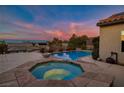 Relaxing pool and spa area with sunset views at 2214 Brighton Point Ave, Henderson, NV 89044