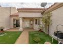 Attractive front entry with walkway, landscaping, and a courtyard at 2400 Stadler Ct, Las Vegas, NV 89134