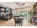 Bright dining area with access to patio and pool views at 2625 Seashore Dr, Las Vegas, NV 89128