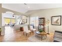 Open living space with a view into the dining area and kitchen at 279 Windsong Echo Dr, Henderson, NV 89012