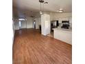 Spacious living area with hardwood floors and a fireplace at 3717 Seneca Highland St, North Las Vegas, NV 89032