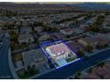 Aerial view of property showcasing surrounding neighborhood and mountain views at 553 Sinfold Park St, Las Vegas, NV 89148