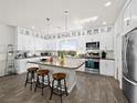 Spacious kitchen with granite countertops, stainless steel appliances, and an island at 7777 Tempest Sol Ave, Las Vegas, NV 89113