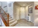 Entryway with staircase, tile flooring, and built-in shelving at 9240 Long Grove Ave, Las Vegas, NV 89149