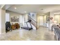 Living room with hardwood floors and a view of the staircase at 9240 Long Grove Ave, Las Vegas, NV 89149