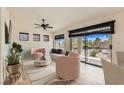 Open living room area with a view to the landscaped outdoor space at 10009 Hemet Dr, Las Vegas, NV 89134