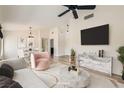 Bright living room featuring a marble coffee table, modern decor, and neutral finishes at 10009 Hemet Dr, Las Vegas, NV 89134