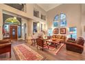 Spacious living room featuring hardwood floors and a high ceiling at 1705 Corta Bella Dr, Las Vegas, NV 89134