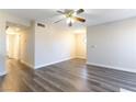 Open living space with laminate floors and neutral wall colors at 2983 Juniper Hills Blvd # 203, Las Vegas, NV 89142