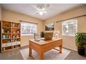 Bright home office with built-in shelving and large desk at 3320 S Fort Apache Rd # 125, Las Vegas, NV 89117