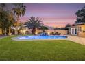 Relaxing pool and patio area with mountain backdrop at 478 Spanish View Ln, Las Vegas, NV 89110