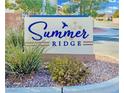 Summer Ridge community sign with lush greenery and desert landscape at 5028 Frozen Springs Ct, Las Vegas, NV 89130